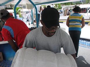 Image #5 - Hurricane Tomas Relief Effort (Packing the goods)